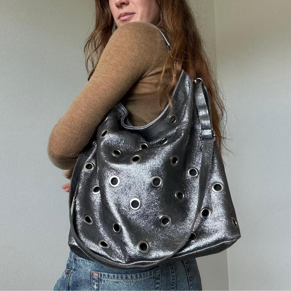 Silver metallic grommet genuine leather hobo bag made in italy